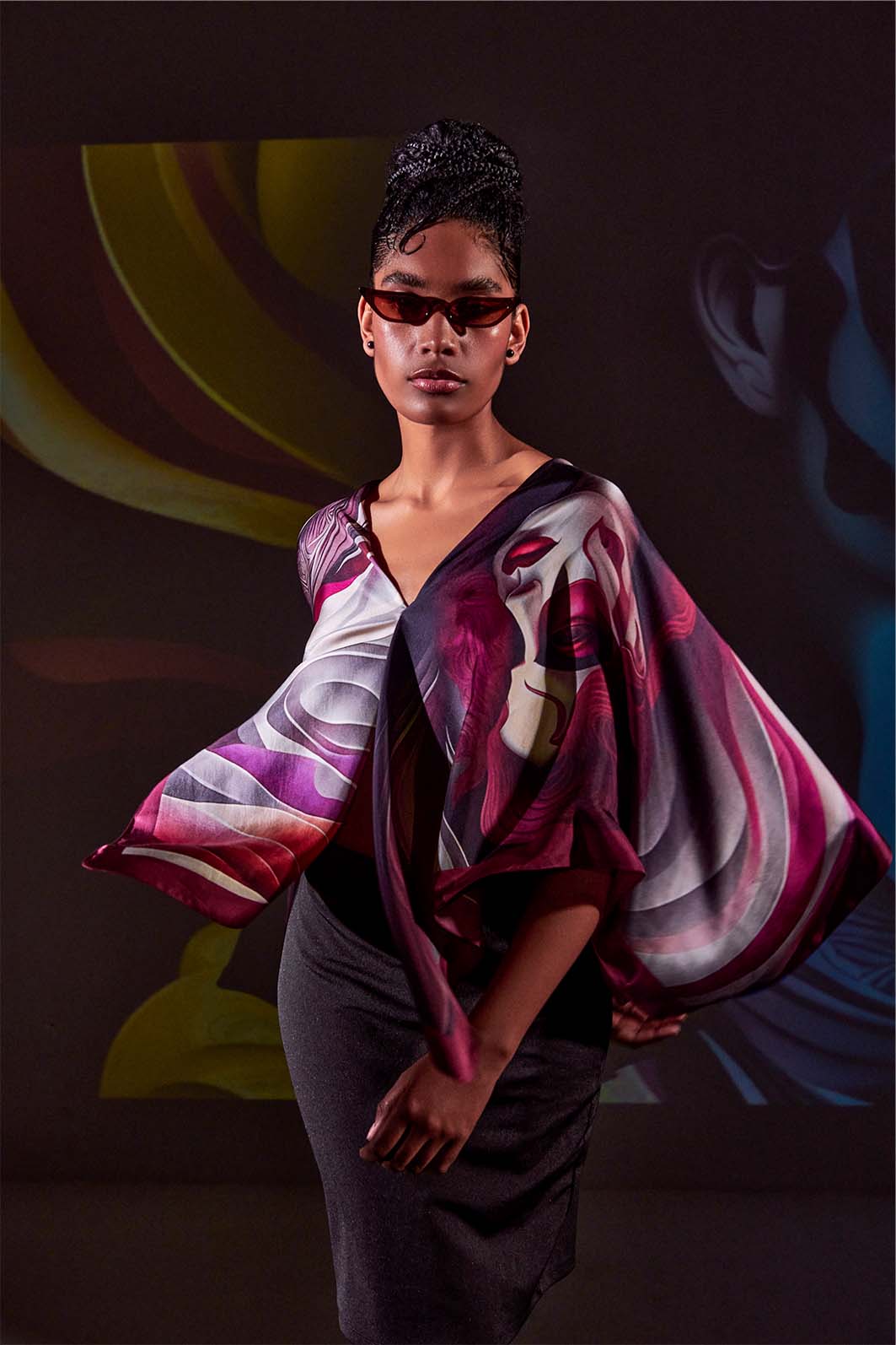 Model wearing Freeque’s Écorché luxury scarf in deep maroon and white, inspired by surrealist anatomical art.