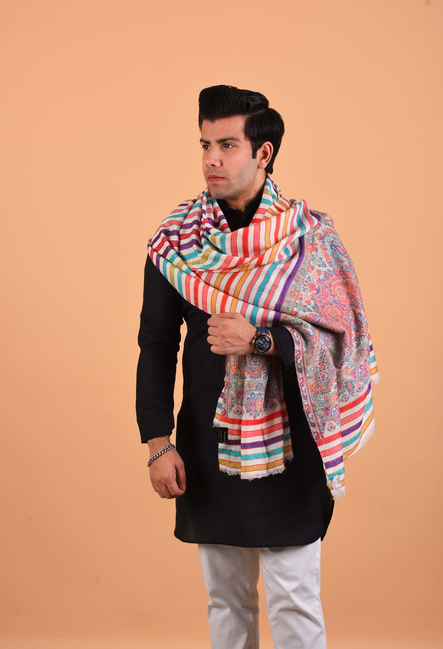 Male model styling the Regal stole over traditional attire