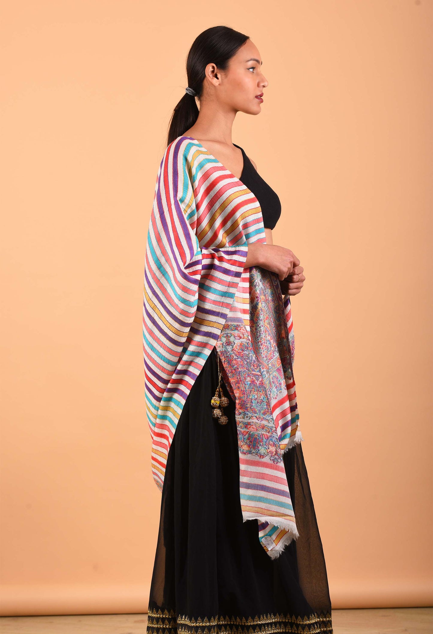 Side view of model wearing Regal stole, showcasing intricate details