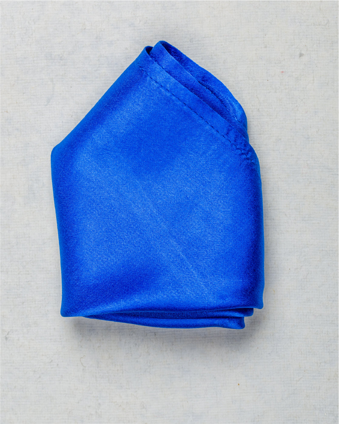 Close-up of Solid Electric Blue Scented Pocket Square - Glossy Satin Silk