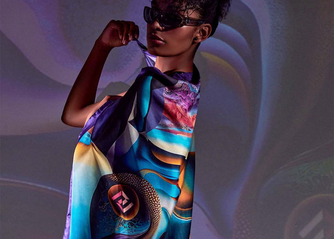 Model wearing luxury scented Epipháneia scarf, inspired by Salvador Dali's surrealistic style