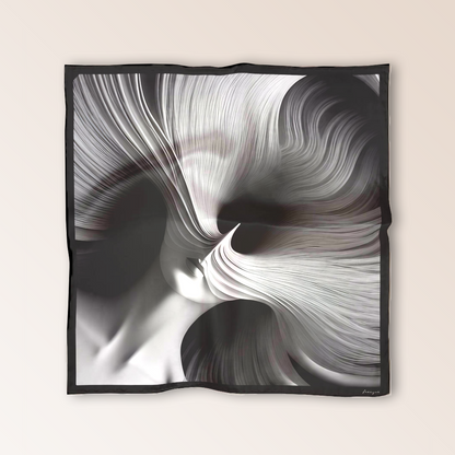 Flat lay of Freeque’s L'Esprit Fluctuant scented luxury scarf in black silk, featuring an abstract, ethereal design.