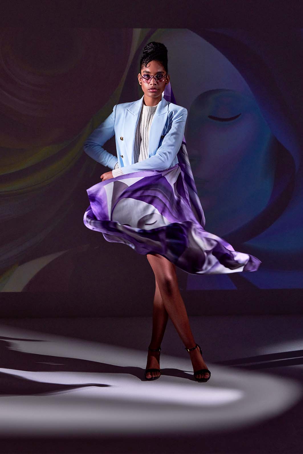 Flowing Voile D’Ombre silk scarf—luxury wearable art in purple, captured in elegant motion.