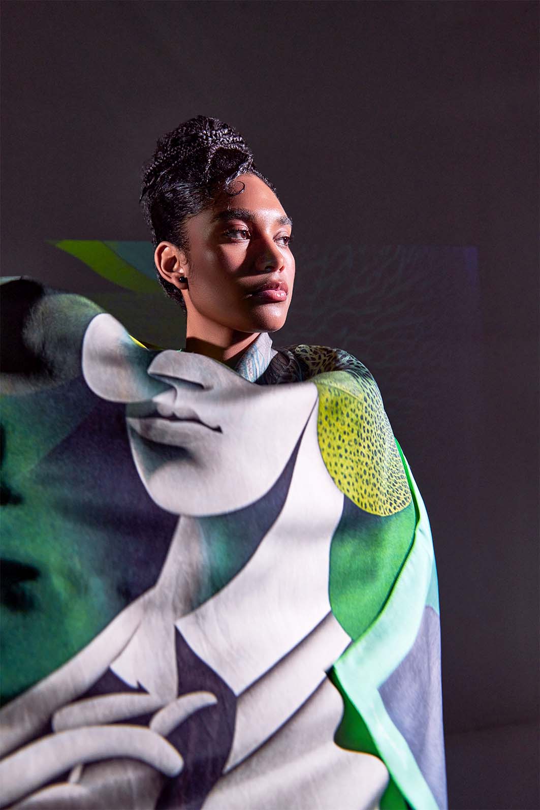 Model wearing Metamorphosis Transformation scarf by Freeque in dark ambiance