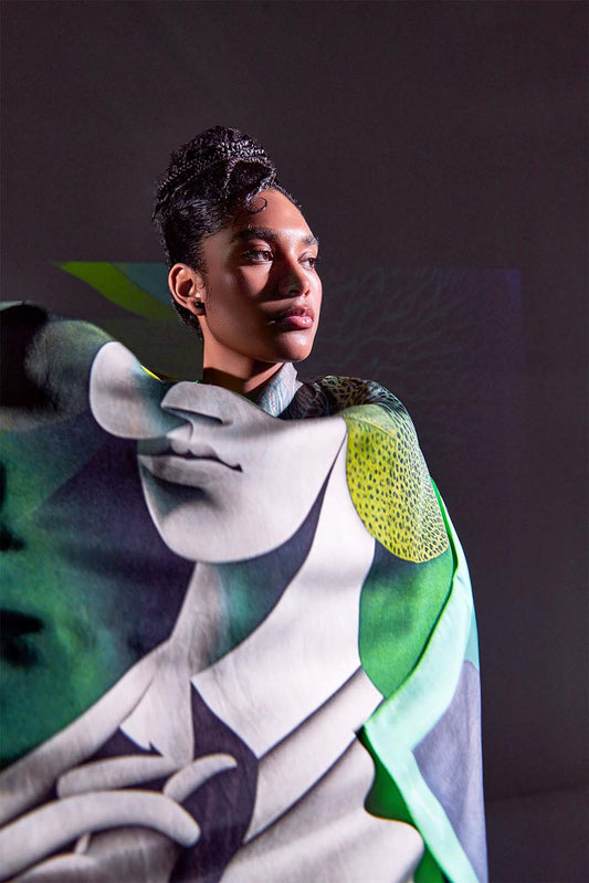 Model wearing Metamorphosis Transformation scarf by Freeque in dark ambiance