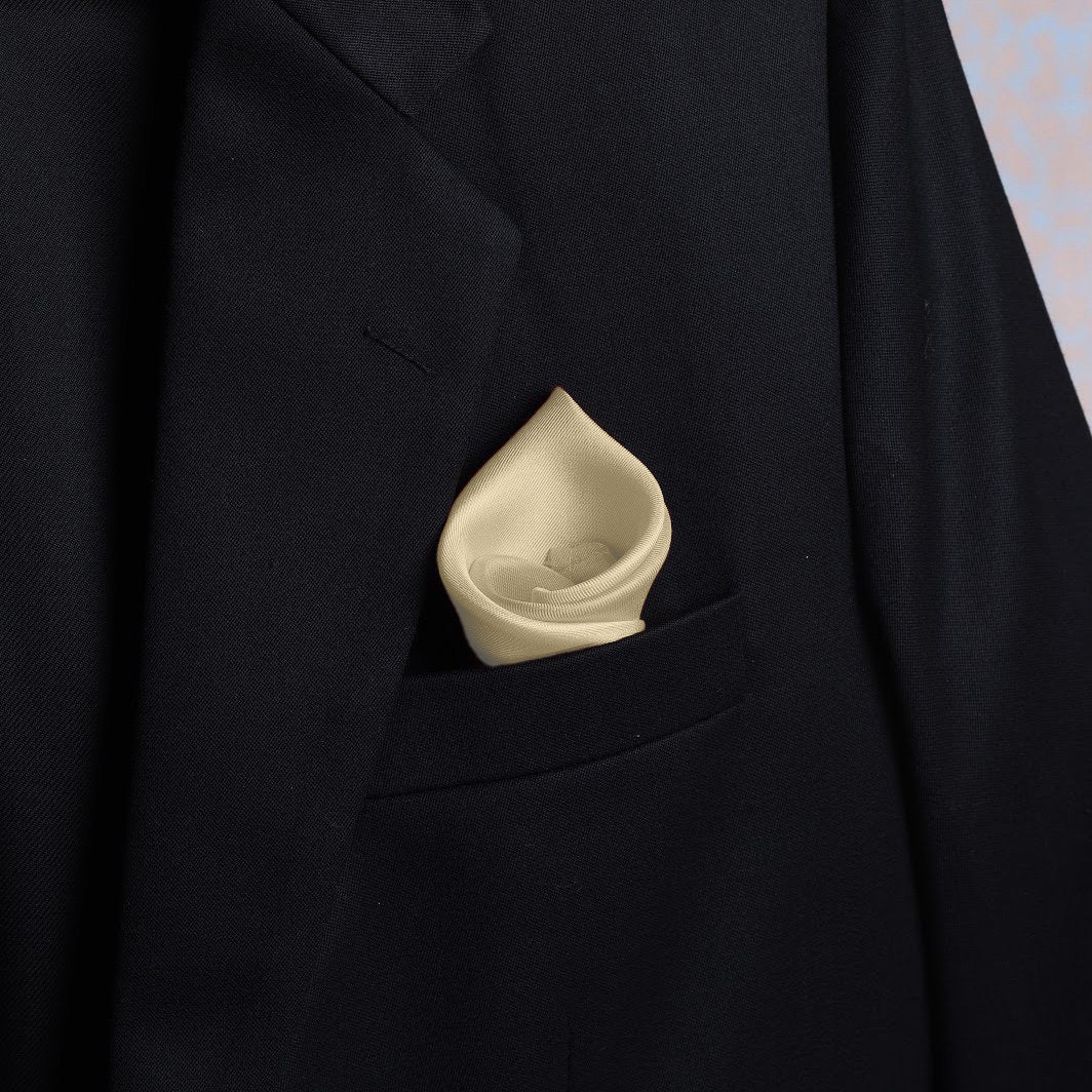 Solid buttercream scented pocket square styled in suit pocket - luxury accessory by Freeque