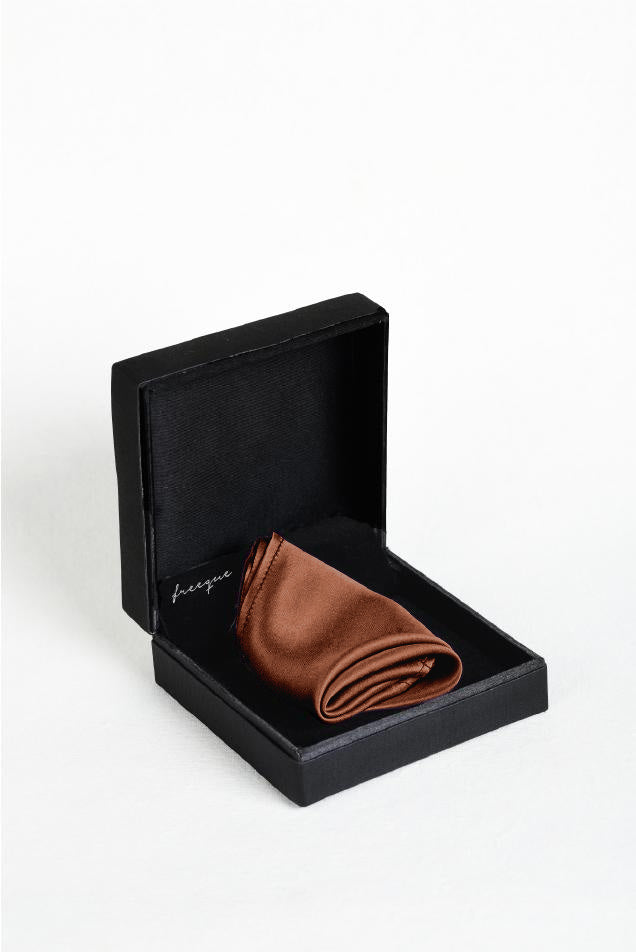 Close-up of chestnut satin silk scented pocket square