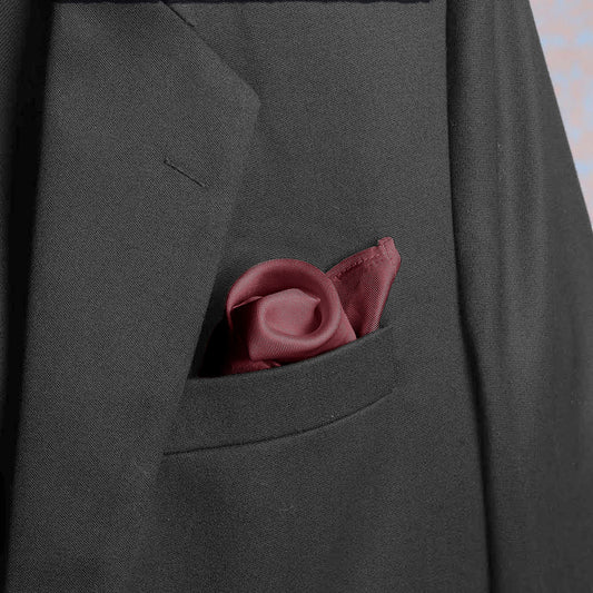 Solid cordovan satin silk pocket square in suit pocket - luxury accessory by Freeque