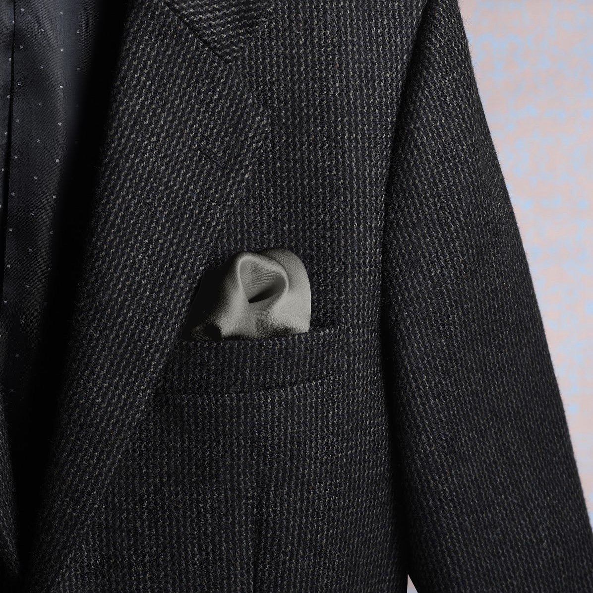Solid stone-colored scented satin silk pocket square styled in a suit pocket - refined elegance by Freeque