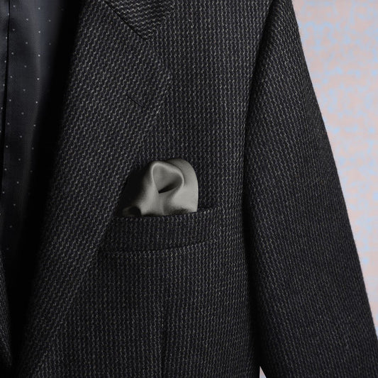 Solid stone-colored scented satin silk pocket square styled in a suit pocket - refined elegance by Freeque