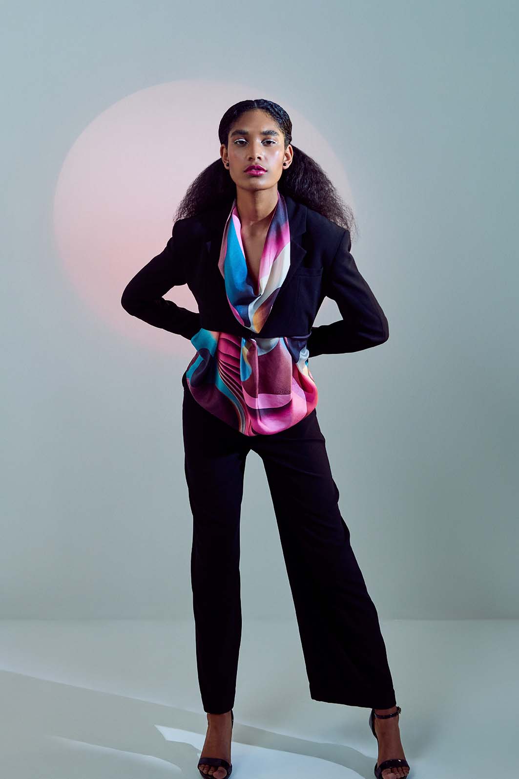 Close-up of Freeque’s Soufflé scarf, a luxury silk accessory blending surrealism and movement, embodying wearable art.