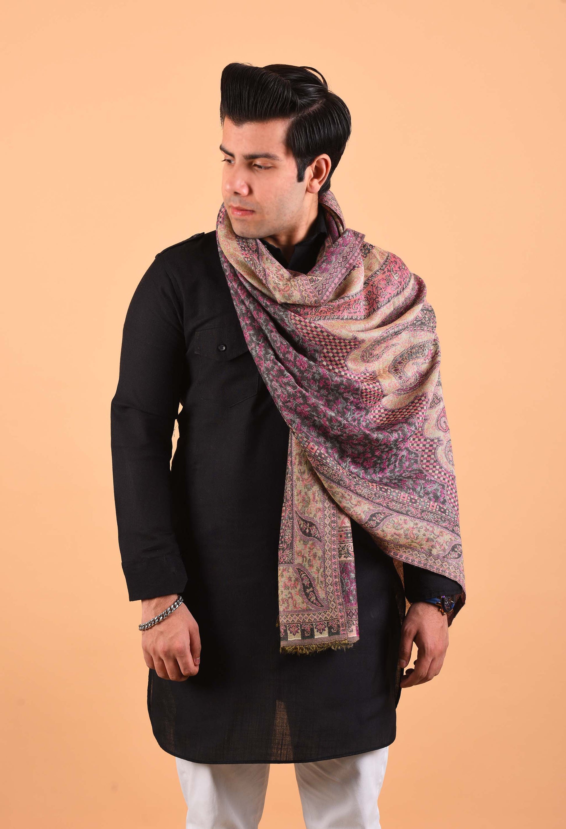 Luxury Aidha camel wool shawl with traditional Indian design, styled on male model in black attire, ideal for elegant winter wear.