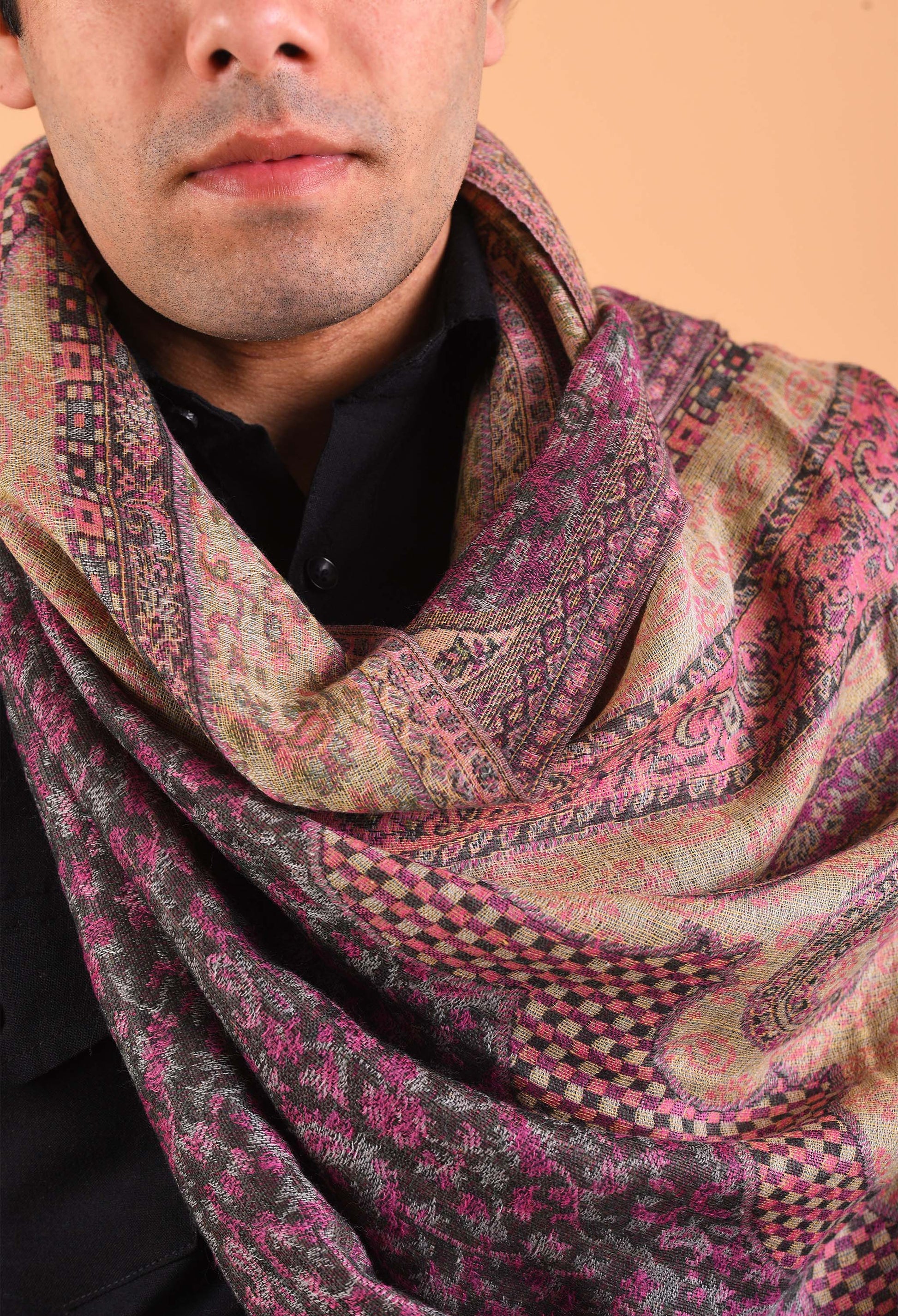 Close-up of Aidha camel wool shawl with intricate Indian pattern, luxury designer scarf for winter.