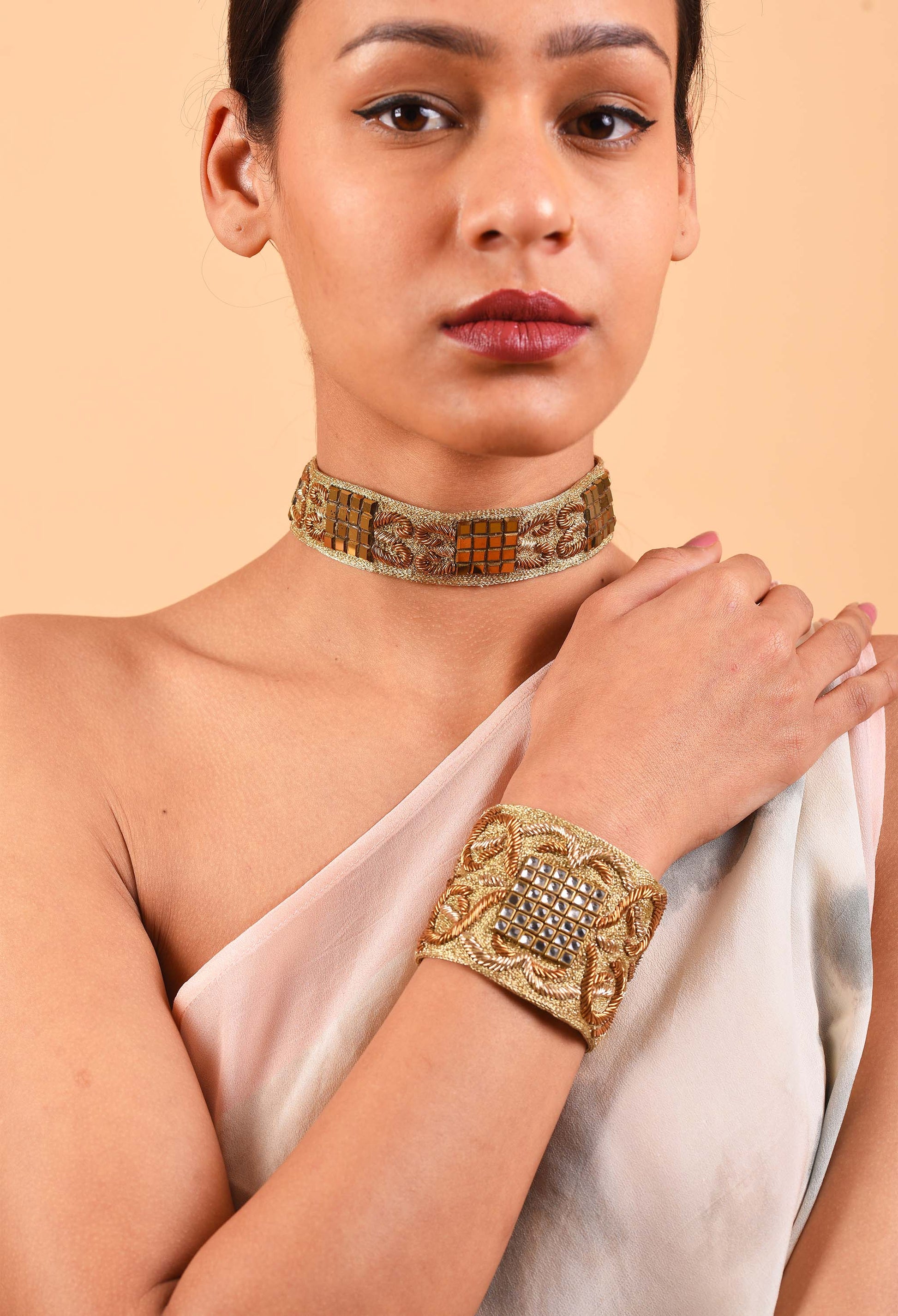 Close-up of Dynasty choker and bracelet set by Freeque, emphasizing the luxurious detail and craftsmanship.