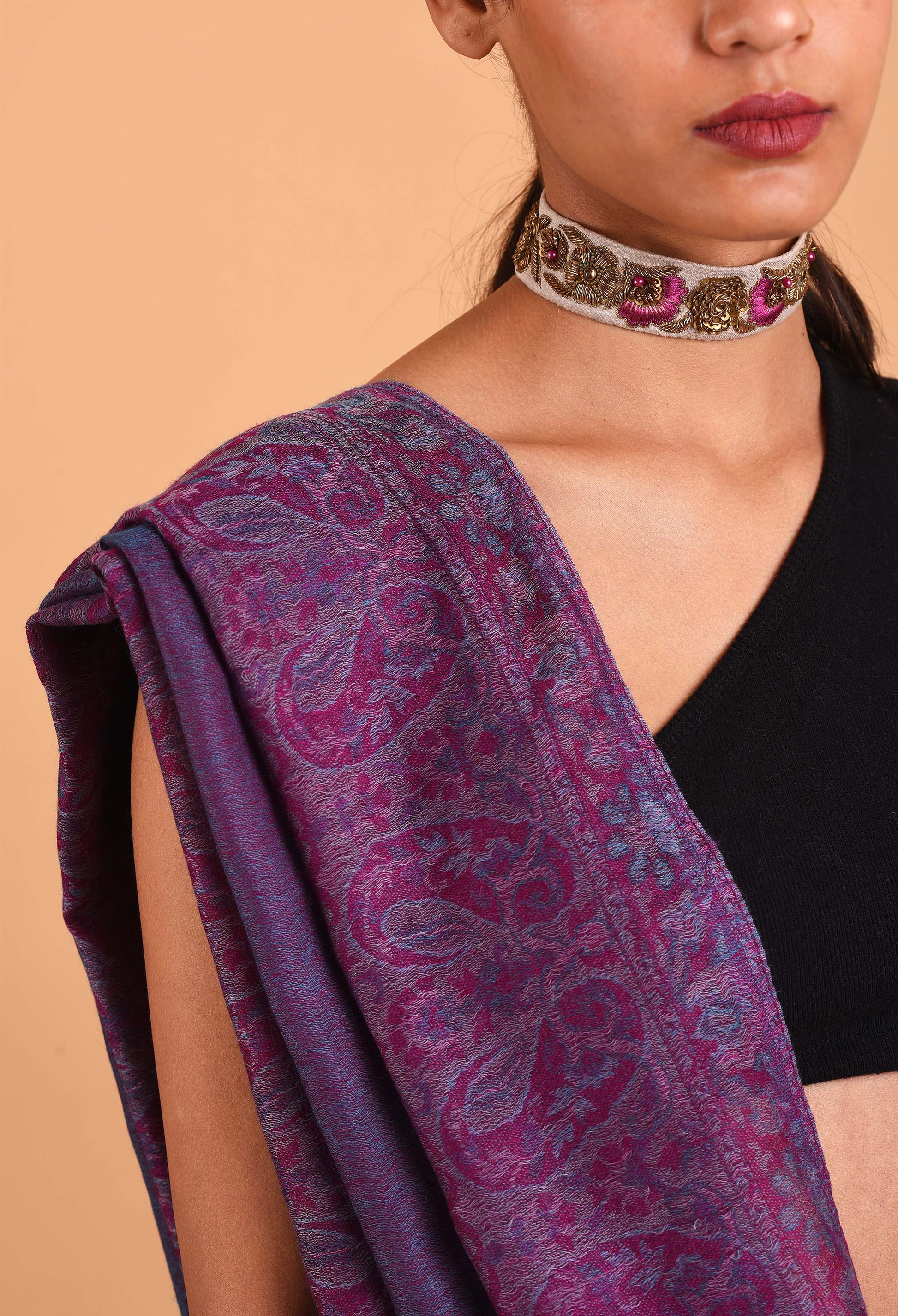 Close-up of the intricate paisley patterns on Freeque’s Fadilah camel wool stole.