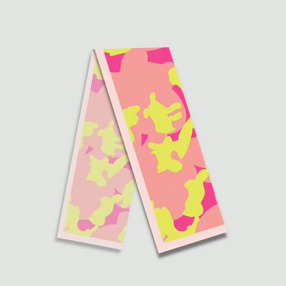Close-up of Freeque Neon Veil stole showcasing pink and yellow pattern details