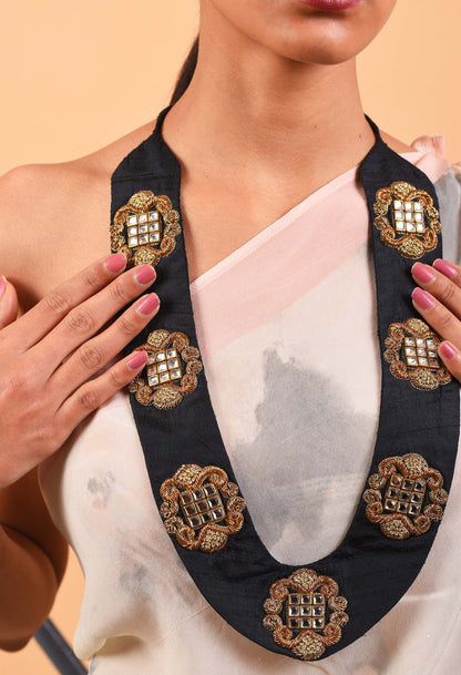 Close-up of Heiress necklace showcasing intricate handwoven detailing with a touch of Indian glamour.