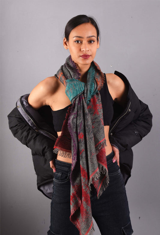 Model wearing Jayden unisex camel wool stole, styled with a black jacket, showcasing a warm winter look.
