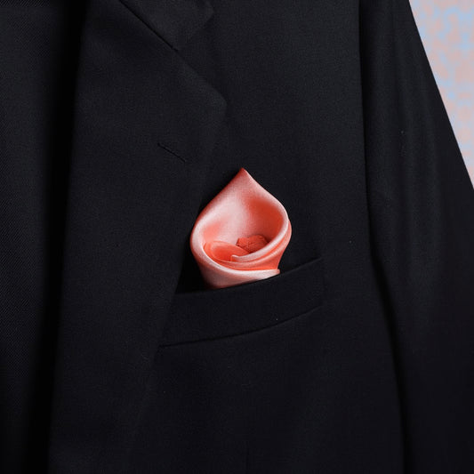 Ombre peach scented pocket square displayed in a suit pocket, luxurious twill silk
