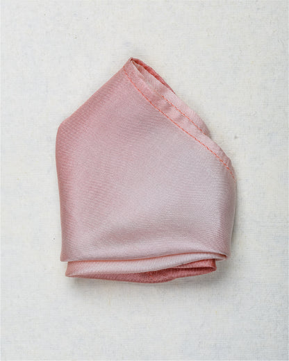 Close-up of Ombre rose gold  scented silk pocket square showing luxury fabric texture
