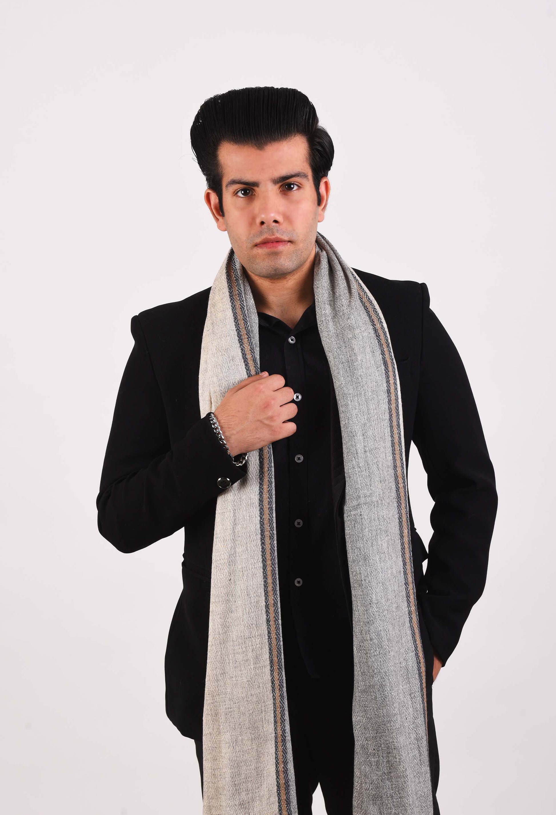 Elegant man styling Parker camel wool stole in a classic look