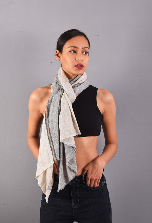Model wearing Parker camel wool stole, showcasing luxury fashion