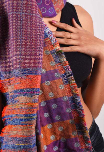 Close-up of detailed weave and vibrant patterns on camel wool Raha stole