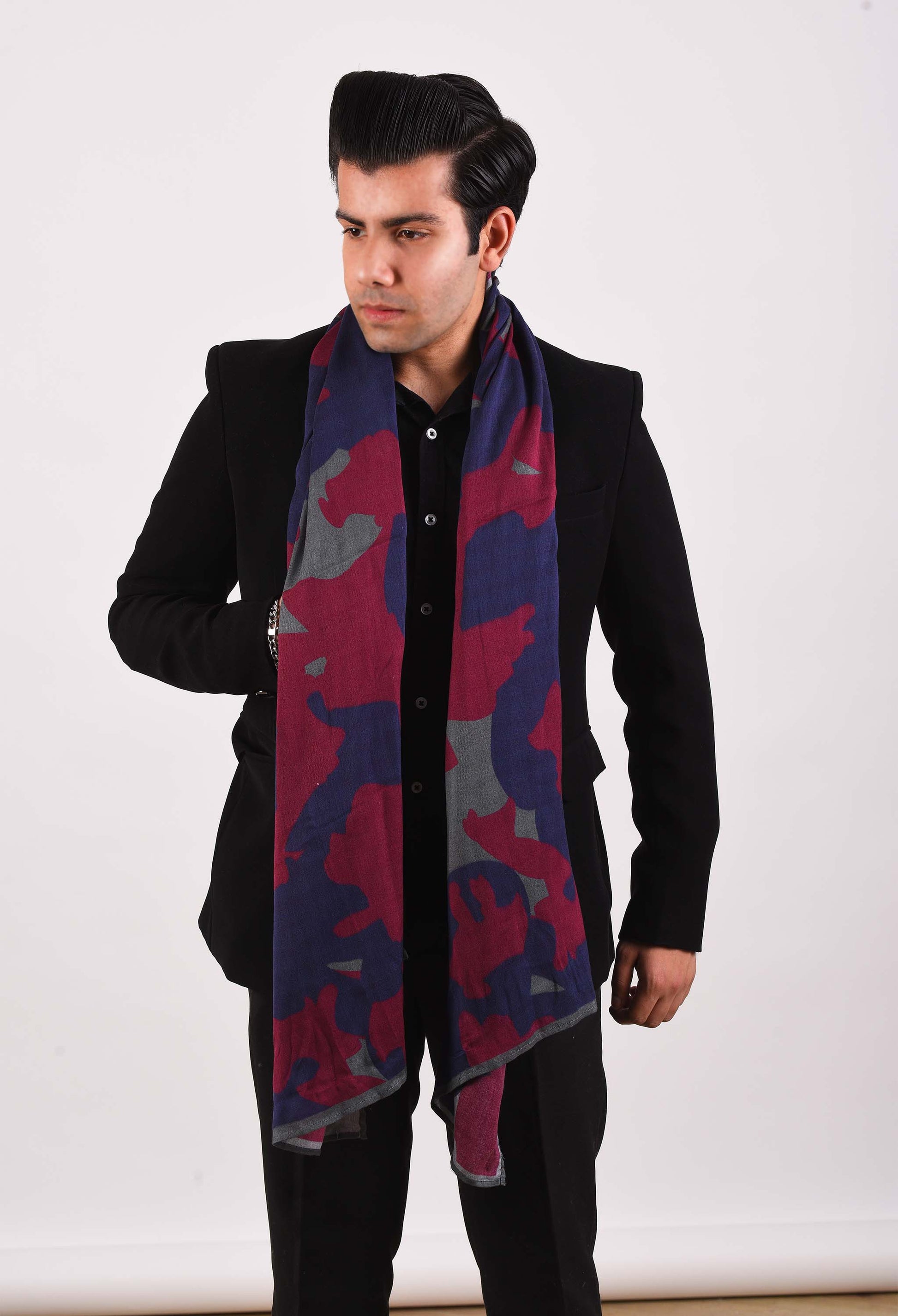 Model styling Raspberry Veil scented stole over a black coat