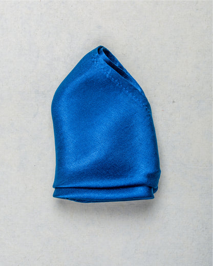 Close-up of solid indigo scented satin silk pocket square - Freeque