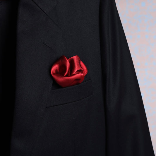 Solid red satin silk pocket square in suit jacket