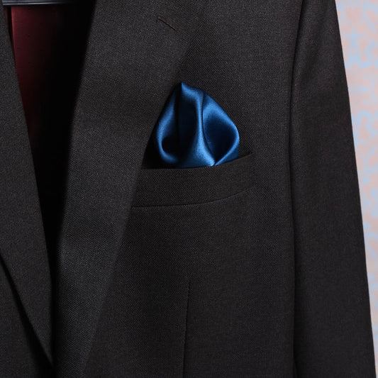 Solid teal blue satin silk pocket square in suit pocket