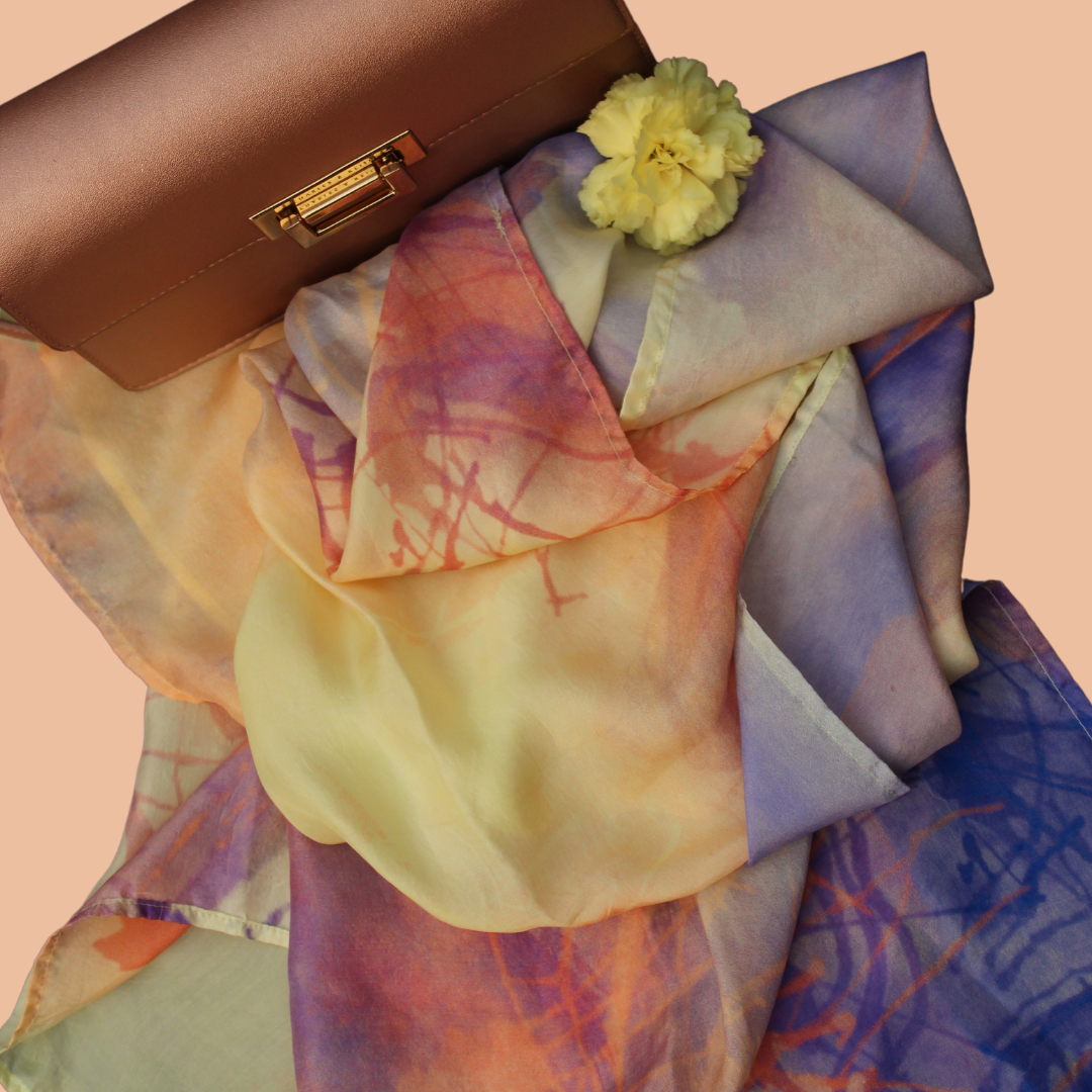Vanilla Dream scented stole by Freeque in a soft, pastel palette, styled with accessories.