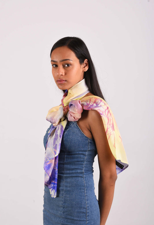 Model showcasing the luxurious Vanilla Dream scented stole by Freeque in a soft, neutral-milky hue.